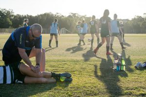 Physiotherapist treating at western pride football club
